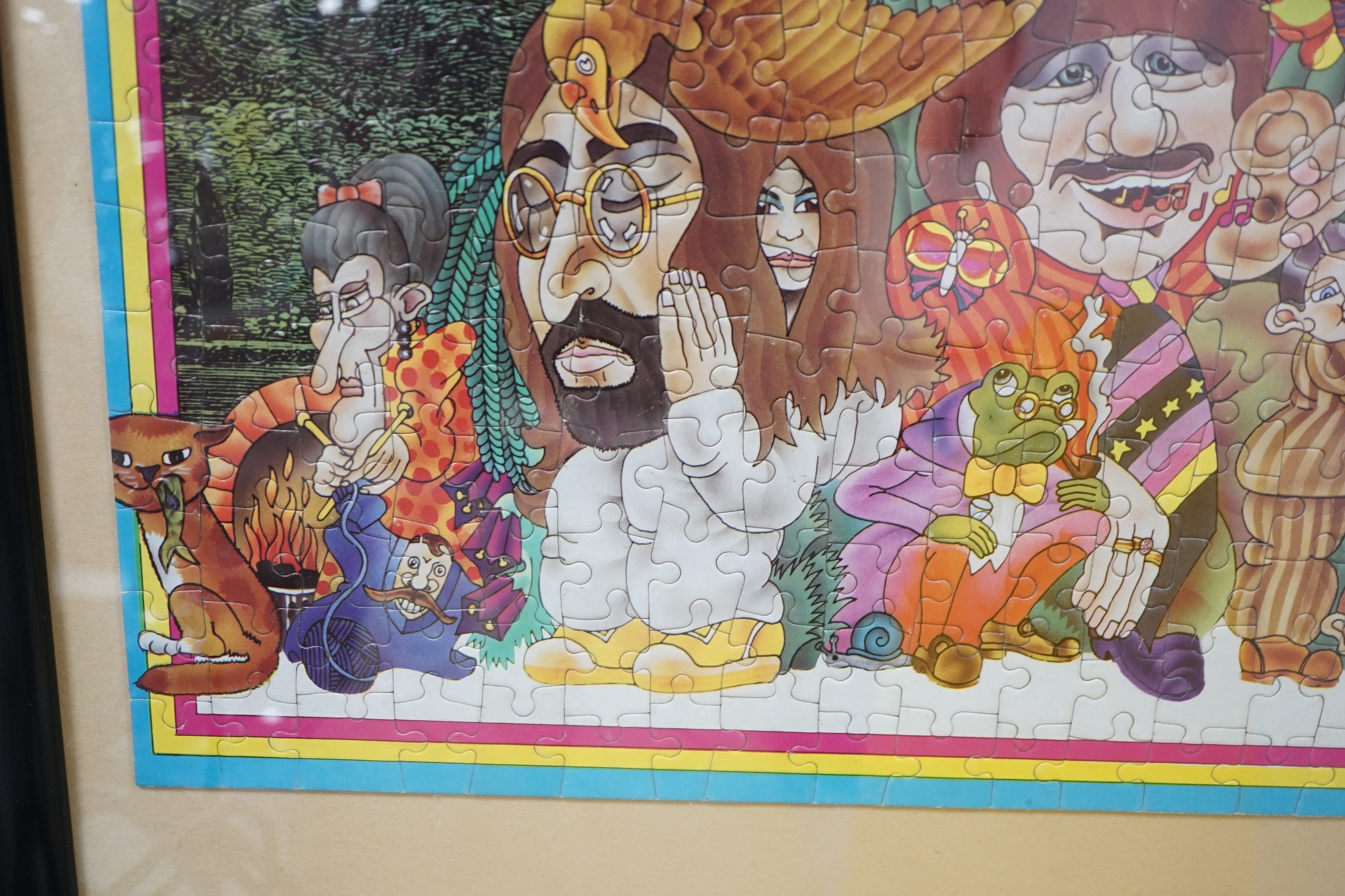 The Beatles Illustrated Lyrics Puzzle in a Puzzle (jigsaw), with colour poster and original box, the puzzle separately framed and glazed